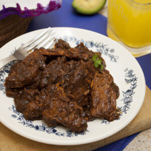 Carne de cerdo en salsa de pasilla